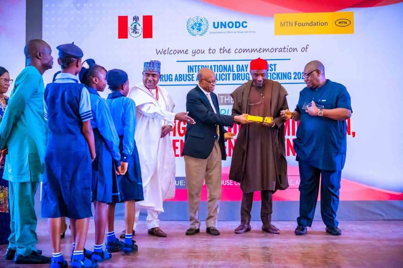 Officials and students at award ceremony